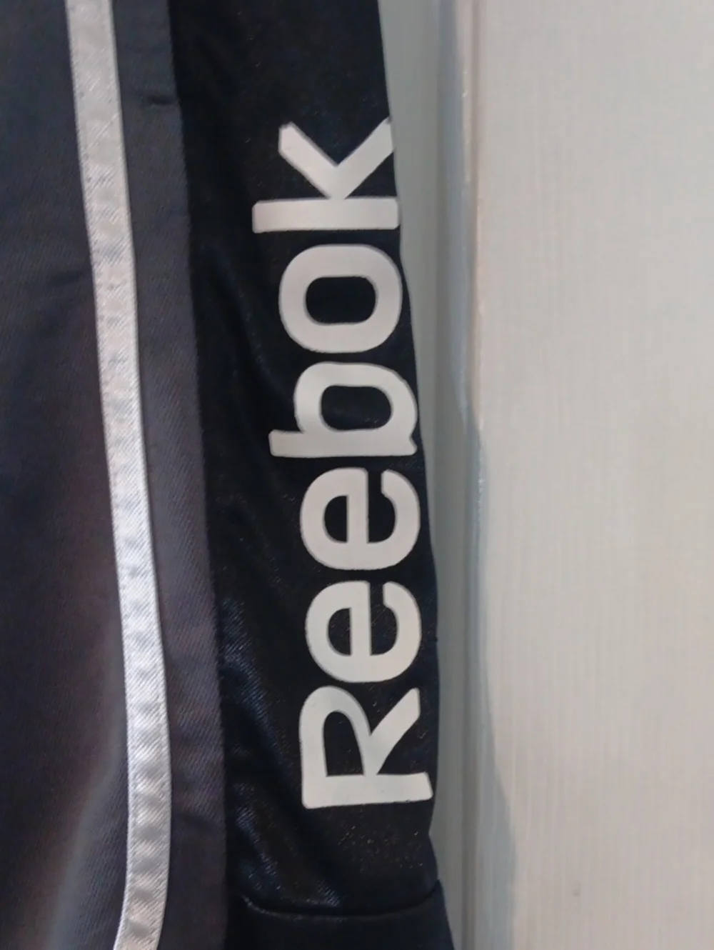 Reebok Men’s Black and Gray Athletic Shorts with Reflective Trim